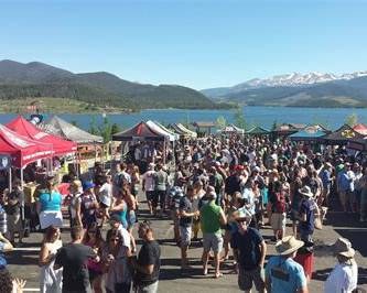 Summer festival crowd gathered on the Dillon lakefront